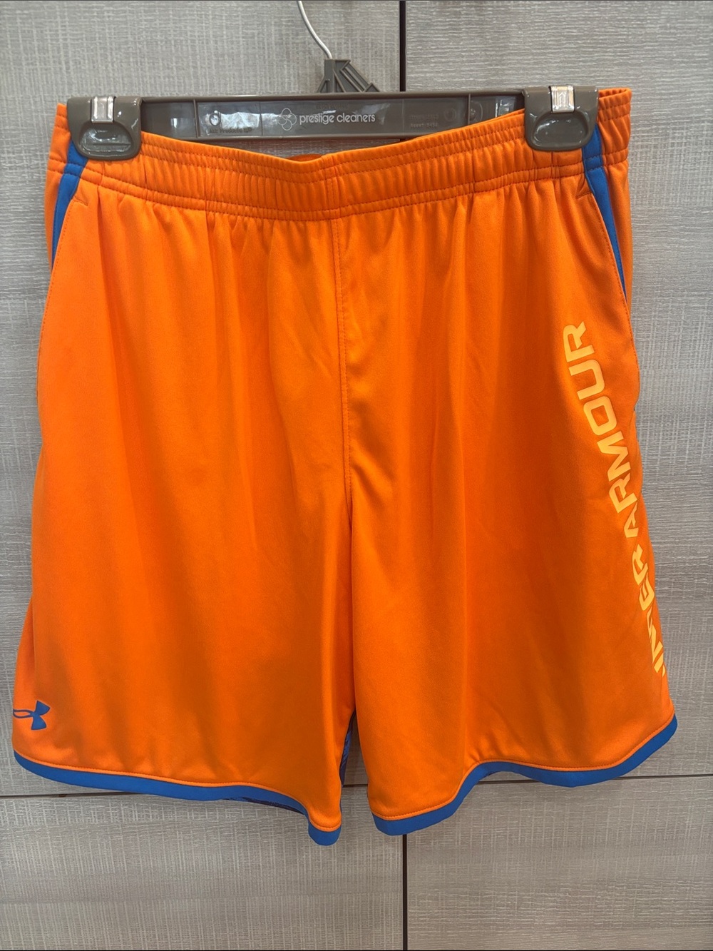Under Armour Boy’s Orange Athletic Shorts with Blue Trim
